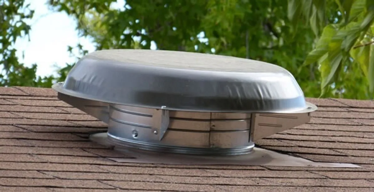 attic fan installation services with low-profile roof ventilation unit in Dayton, OH