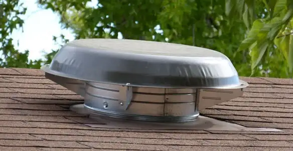 attic fan installation services with low-profile roof ventilation unit in Dayton, OH