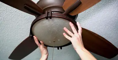 Ceiling fan repair and reinstallation on ceiling mount in Dayton, OH