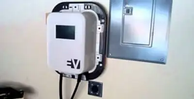 Electric car charger installation with wall-mounted EV charging station in Dayton, OH