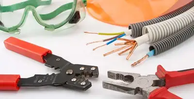 Electrical wiring repair with professional tools and safety equipment in Bellbrook, OH