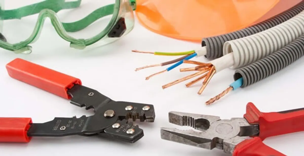 Electrical wiring repair with professional tools and safety equipment in New Lebanon, OH