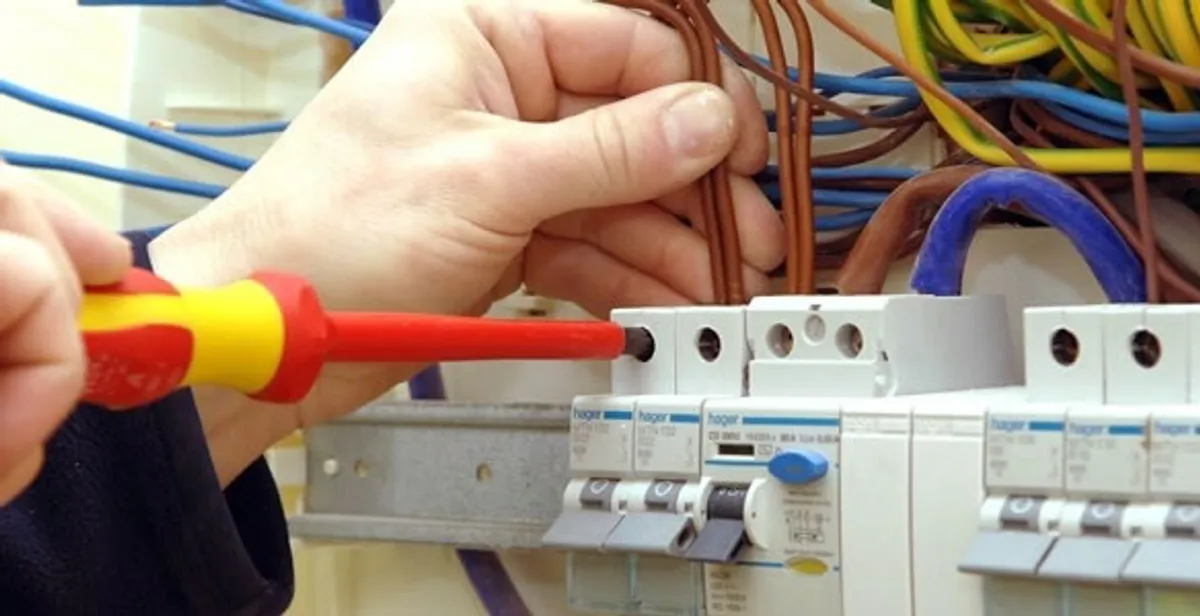 electrician services performing professional electrical panel wiring and connections in Dayton, OH
