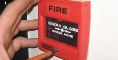 fire alarm installation service showing manual fire alarm pull station installed by licensed electricians in Dayton, OH