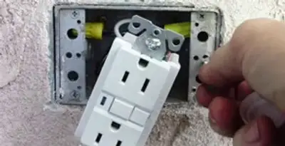 gfci circuits service showing installation of a ground fault circuit interrupter outlet by licensed electricians in Dayton, OH