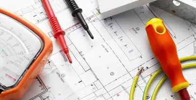 licensed electrician planning and testing electrical systems using professional tools in Dayton, OH