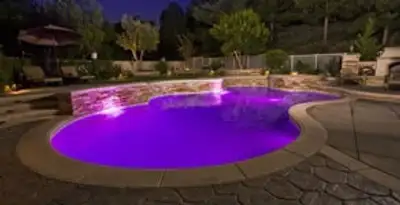 pool light installation and repair services illuminating a residential swimming pool in Dayton, OH