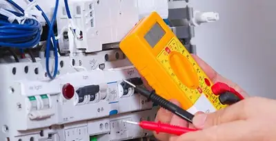 Residential electrician testing home electrical panel for safety and performance in Dayton, OH