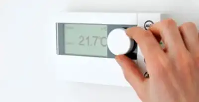 Thermostat installation service with professional adjusting temperature control in Dayton, OH