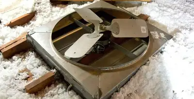 whole house fan installation services with attic-mounted ventilation unit in Dayton, OH